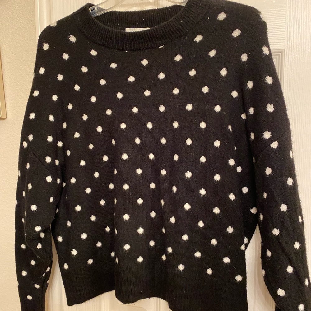 H&M black sweater with white pooka dots